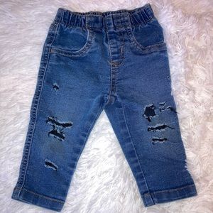 Distressed baby jeans